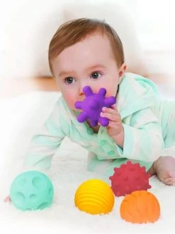 6 Balles Souples Sensorielles INFANTINO Multicolore - Infantino -Boutique Ergobaby 6 balles souples sensorielles infantino 2