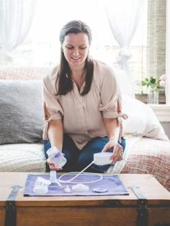 Tire-lait électrique Simple Compact LANSINOH Blanc - Lansinoh -Boutique Ergobaby tire lait electrique simple compact lansinoh 2