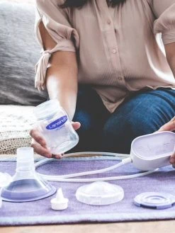 Tire-lait électrique Simple Compact LANSINOH Blanc - Lansinoh -Boutique Ergobaby tire lait electrique simple compact lansinoh 3